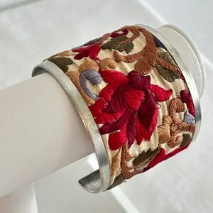 Metal Cuff Bracelet Covered In Embroidered Floral Ribbon Silver Tone